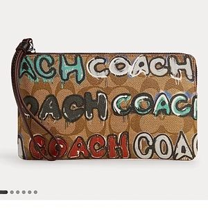 Coach Limited Edition Large Corner Zip Wristlet In Signature Canvas